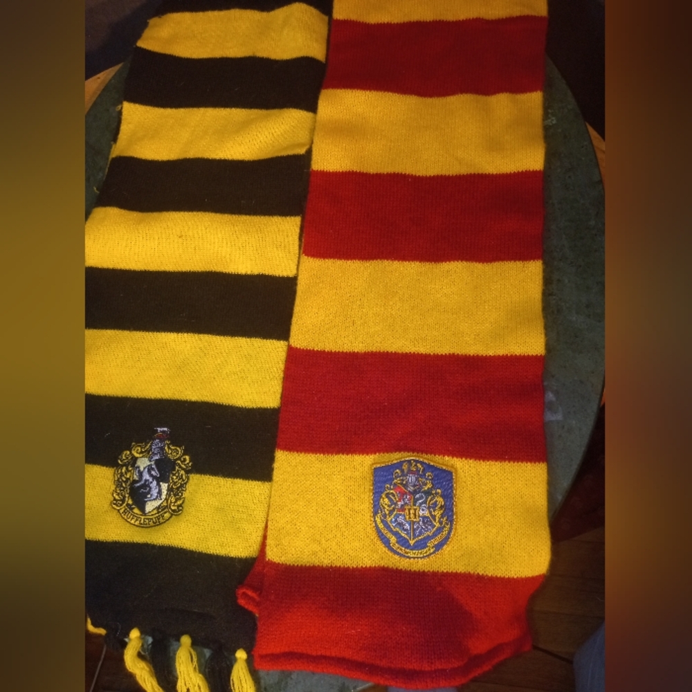 Hogwarts & HufflePuff scarves. 65" long, knit with embroidered shield.